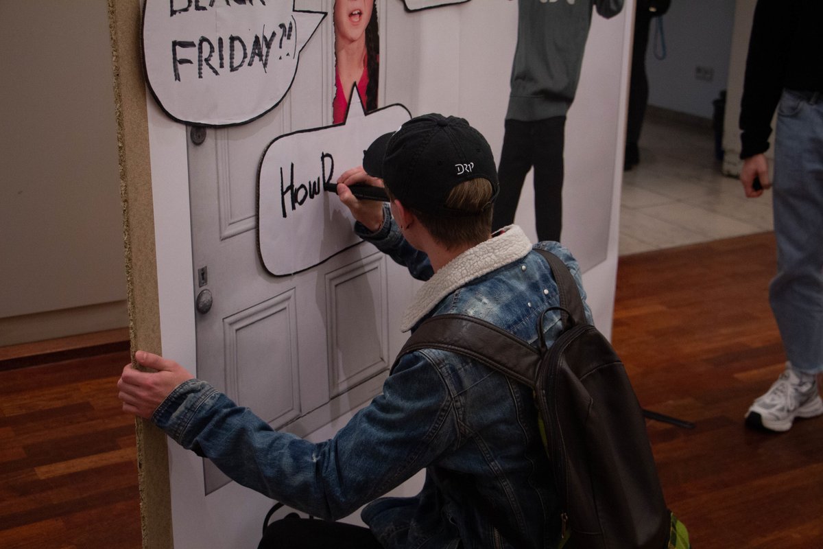 Visitor filling out speech bubble